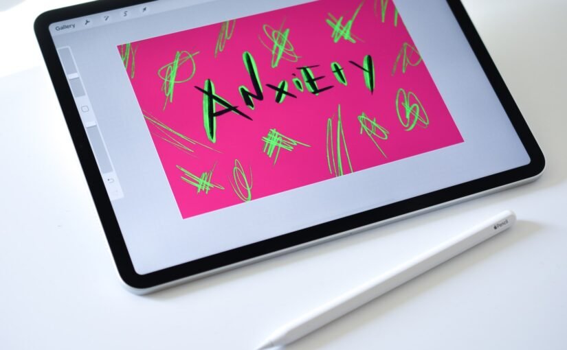 black ipad on white table
